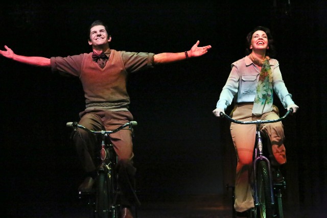 Happy Couple Cycling On Stage